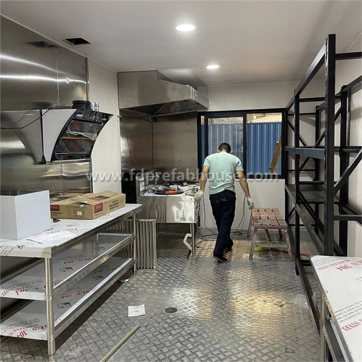 Decorated Container Kitchen With Metal Carved Panels